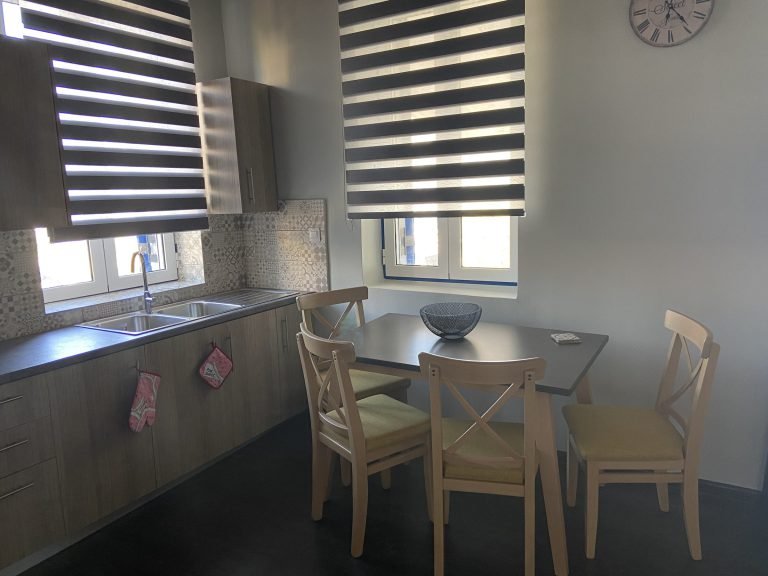 Dining table in the kitchen, upper sea-view apartment, Aphrodite Apartments Mytikas